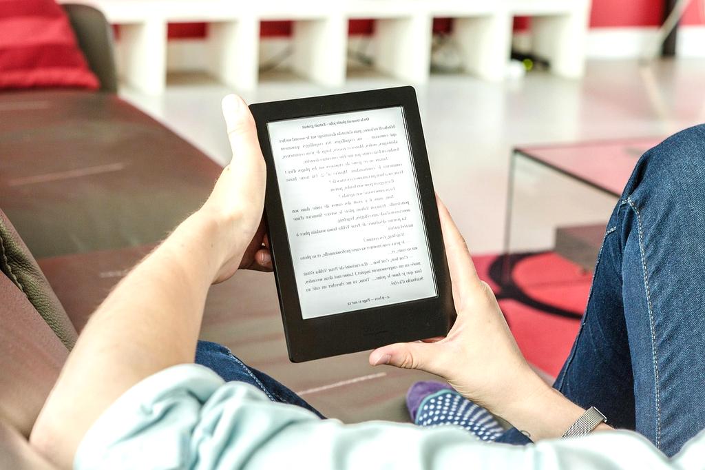 Person reading tech blog on a tablet